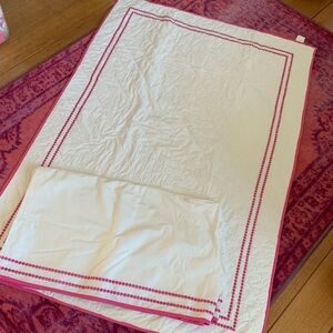 Pottery Barn quilt and crib skirt.